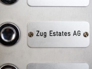Zug Estate ignorierte Zinssenkungen im ersten Halbjahr